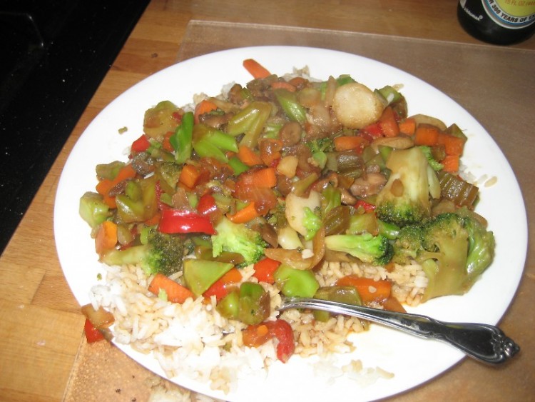 Stir fry made with frozen vegetables, rice and soy sauce