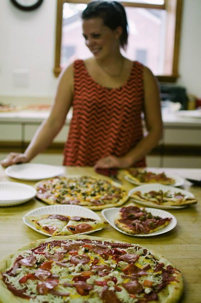 A previous Love Feast included pizzas cumulatively made from single ingredients brought by guests.