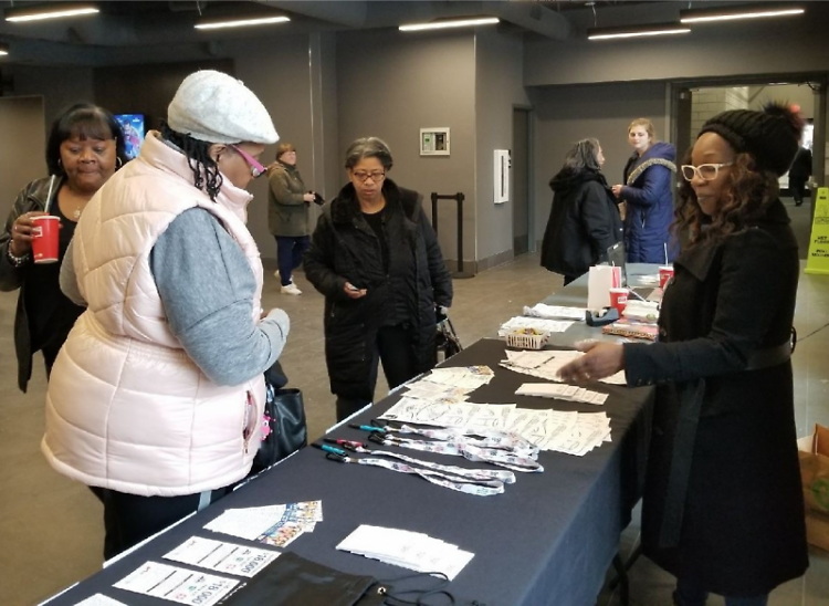 Grand Rapids census ambassadors answering questions about the 2020 census at Celebration Cinema Studio Park on January 20, 2020