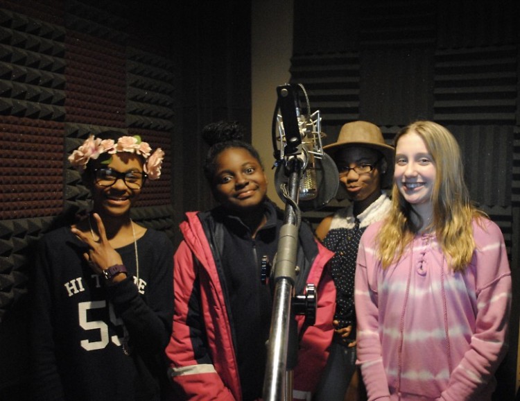 CYC and Triumph students prepare to record for the spoken word and music album. 
