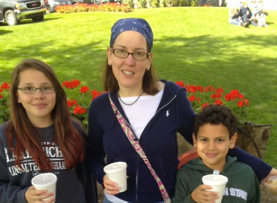 Alyssa Morillo Scheidt and her children at the apple orchard