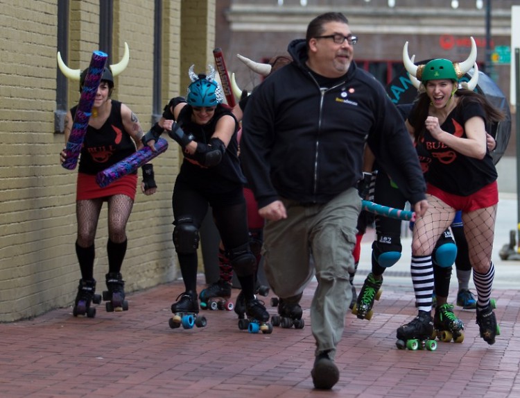 A participant runs from Grand Rapids Roller Girls during a previous Running of the Bulls event.