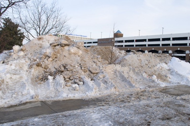 Snow piled near the corner of Coit Avenue and Hastings Street