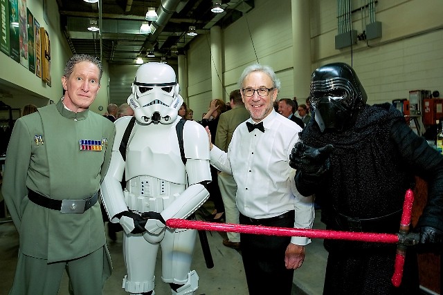 Bob Bernhardt, principal pops conductor of the Grand Rapids Symphony, with characters from 'Star Wars.'