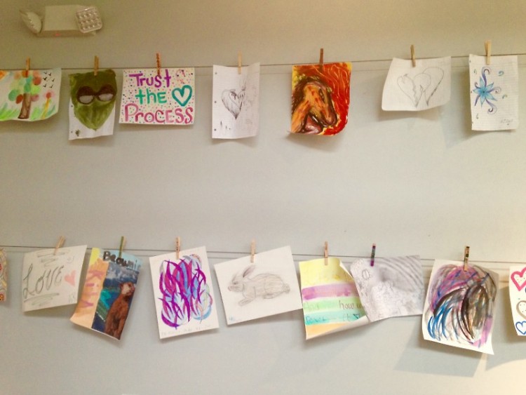 Hanging artwork at HQ crafted by youth, staff and volunteers.  