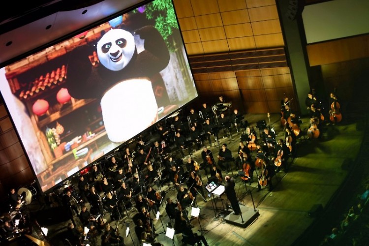 Guest conductor Justin Freer leads the Grand Rapids Pops in DreamWorks Animation in Concert in DeVos Performance Hall.