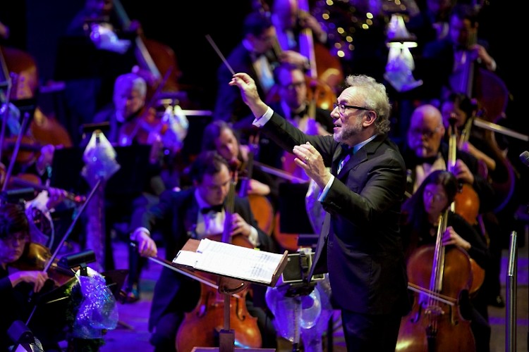 Principal Pops Conductor Bob Bernhardt leads the Grand Rapids Symphony in the Holiday Pops.