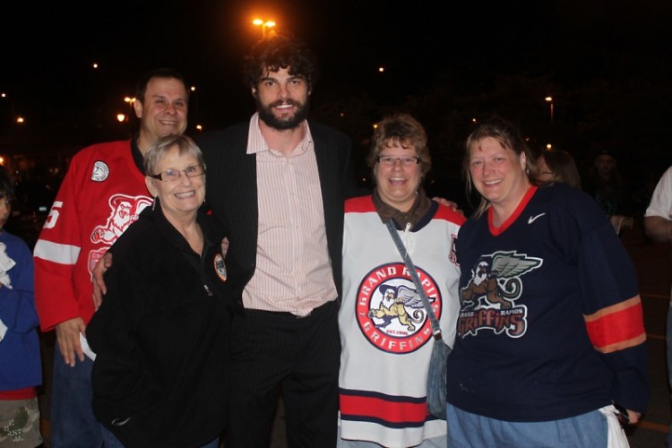 Griffins captain Jeff Hoggan with Griffins Booster Club memebers Ken Stauffer, Kit Domers, Jill DeWitt and Mary Theeuwes