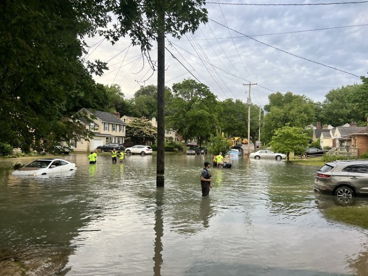 Adams Street flooded after water main break on June 13, 2024