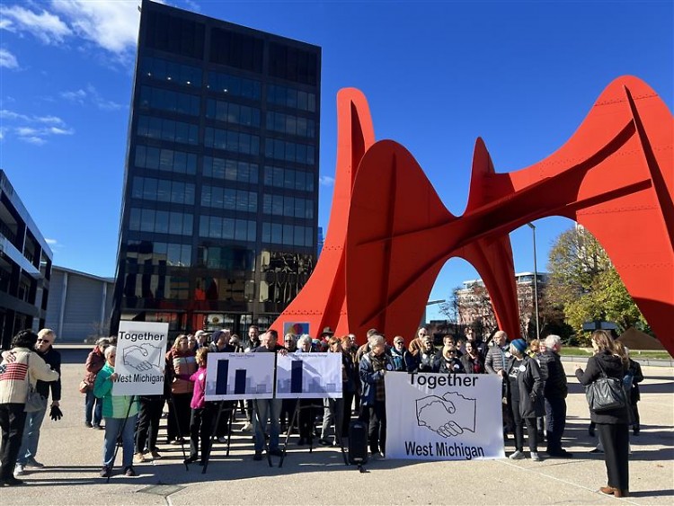 Together West Michigan coalition gathers at Calder Plaza to oppose tax subsidies for the Three Towers development.