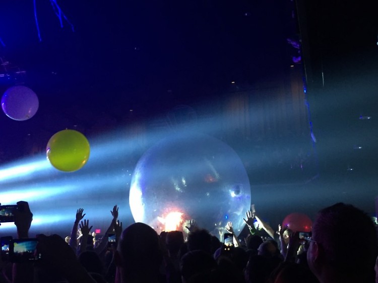Wayne Coyne sings from within his "space bubble"