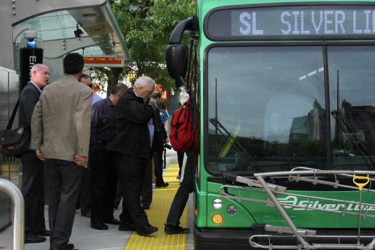 Passengers board the Silver Line in downtown Grand Rapids.