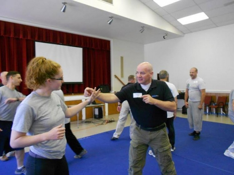  Instructor Craig Gray demonstrates self-defense technique.