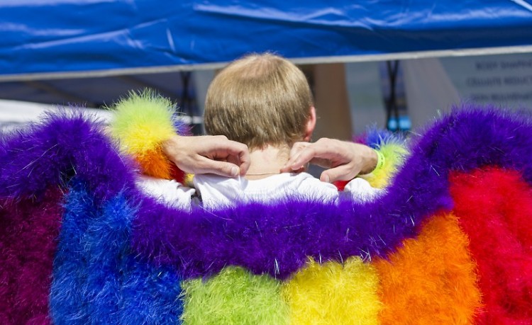 An attendee showing their wings at a previous Grand Rapids Pride Festival