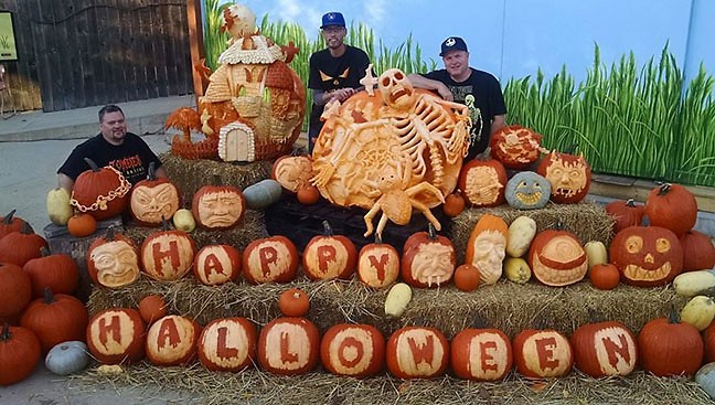 Pumpkin carver, Greg Butauski with some of his carvings.