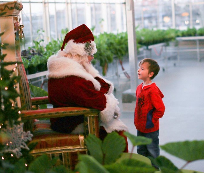 Santa talks with a visitor