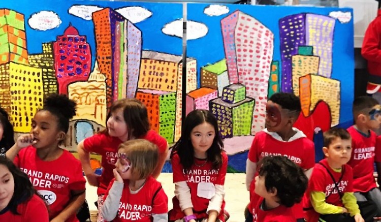 Erica Soto led the Kids Summit, where attendees painted the Grand Rapids' skyline.