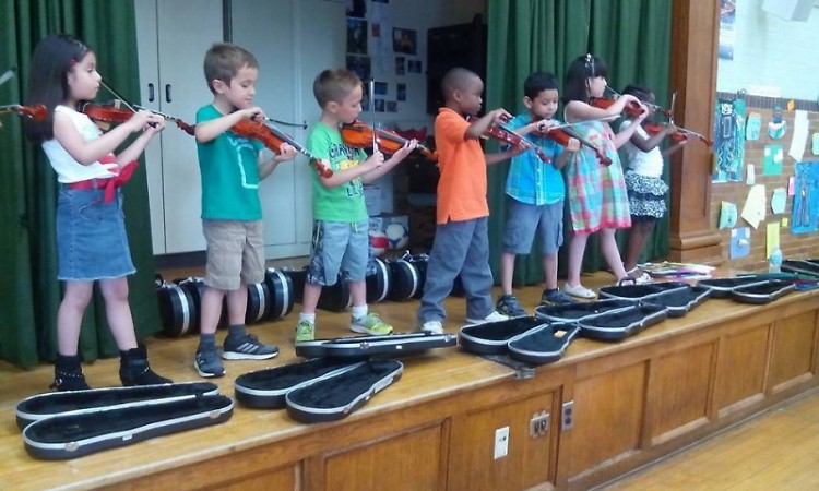Student performing at Congress Elementary School