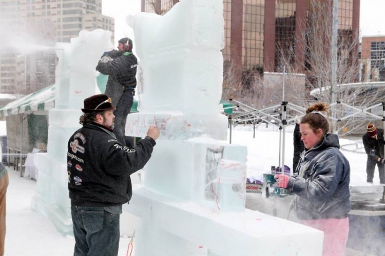 Local couple creating an ice sculpture together. 
