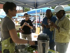 Community members shopping at the Southeast Farmers Market