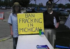 Committee to Ban Fracking in Michigan petitioners at a booth in Bay City.