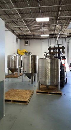 Brewing equipment being moved into place