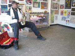 Walter plays the sax at the studio.