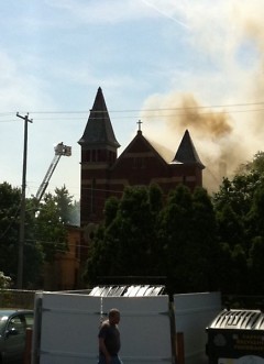 Smoke pouring out of the church building