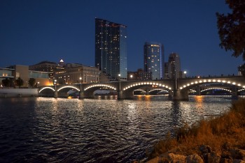 Downtown Grand Rapids lit up at nighttime.