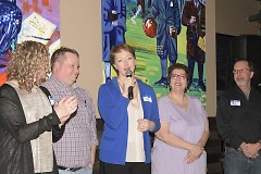 Lauren Taylor, in blue, announcing that she would be running for Michigan's State Representative for the 86th district.