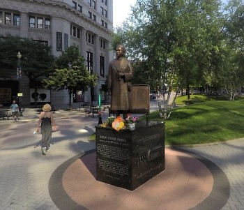 Rosa Parks statue, next to Monroe Center St. NW and the new Breonna Taylor Way.