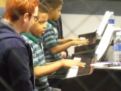 BGCGRYC Music Program Coordinator Casey Stratton teaching piano lessons.