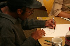 Member Damon Crawford works on a piece during the biweekly meetup.