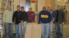 Woodshop volunteers turn out pieces of cabinetry that can be painted to match furniture for purchase at Builder's Abundance.