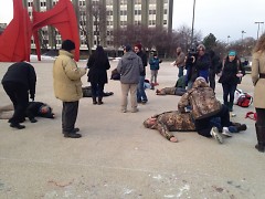 The rally at Calder Plaza included drawing chalk outline bodies around the plaza
