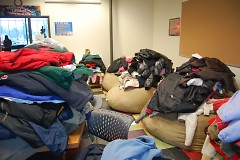 Coats from Taco Bell coat drive sorted out at the Steil Club.