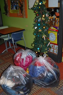 Numerous garbage bags full of winter coats filled Boys & Girls Clubs this week.
