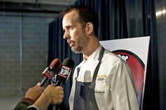 Brian Perrone, executive chef and co-founder answers question from the media