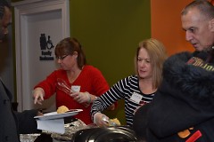 Volunteers serving nutritious meals in December 2016.