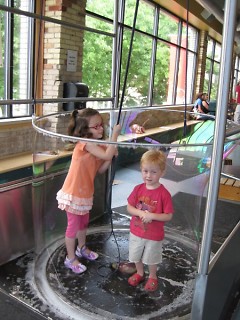 Children enjoying the bubble station at the Grand Rapids Children's Museum