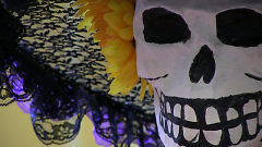 La Calavera Catrina, or Elegant Skull, decorating a community member’s altar at Día de los Muertos 2016.