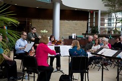 Grand Rapids Symphony's Music for Health musicians play for an open house at Spectrum Health's Lemmen-Holton Cancer Pavilion.