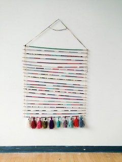 The Friendship Fiber Wall Hanging, designed by Kelly Allen, now hangs in the Herkimer Community Room