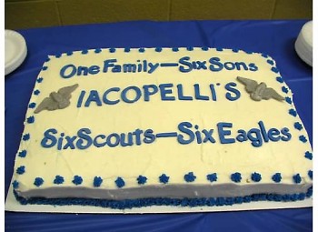 Cake celebrating six Iacobelli Eagle Scouts