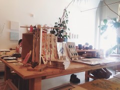 A table at Have Company with various handmade items.
