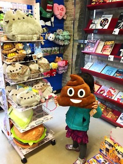 The Vault also carries a variety of toys, apparel and accessories, such as these Pusheen and emoji plushies.