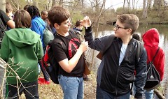 Seventh-grade students from Pinewood Middle School explore the water quality of Buck Creek