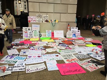 Signs left outside the Trump International Hotel