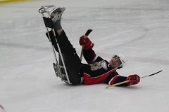 Former Griffin captain Garnet Exelby experiences the challenges of sled hockey during last year's Griffins-Sled Wings game