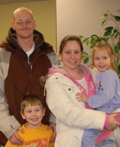 A happy family served by the Kent County Tax Credit Coalition.